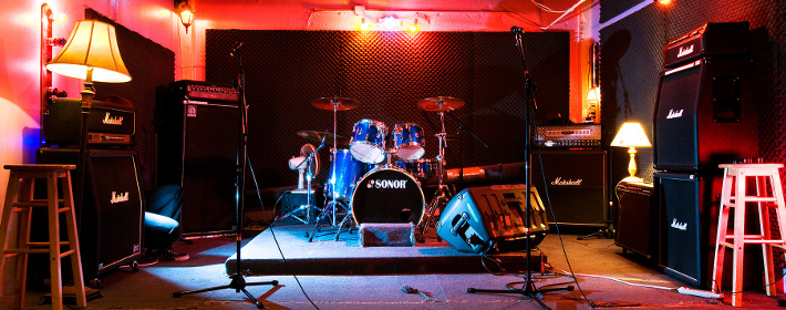 Four tube powered guitar amps per room